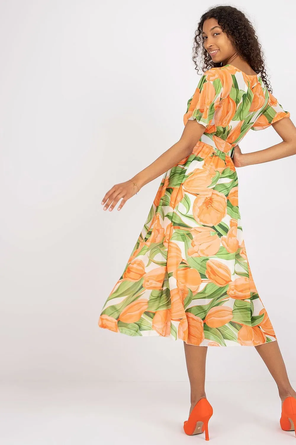 Chic Midi Dress with Colorful Prints and Coordinating Belt