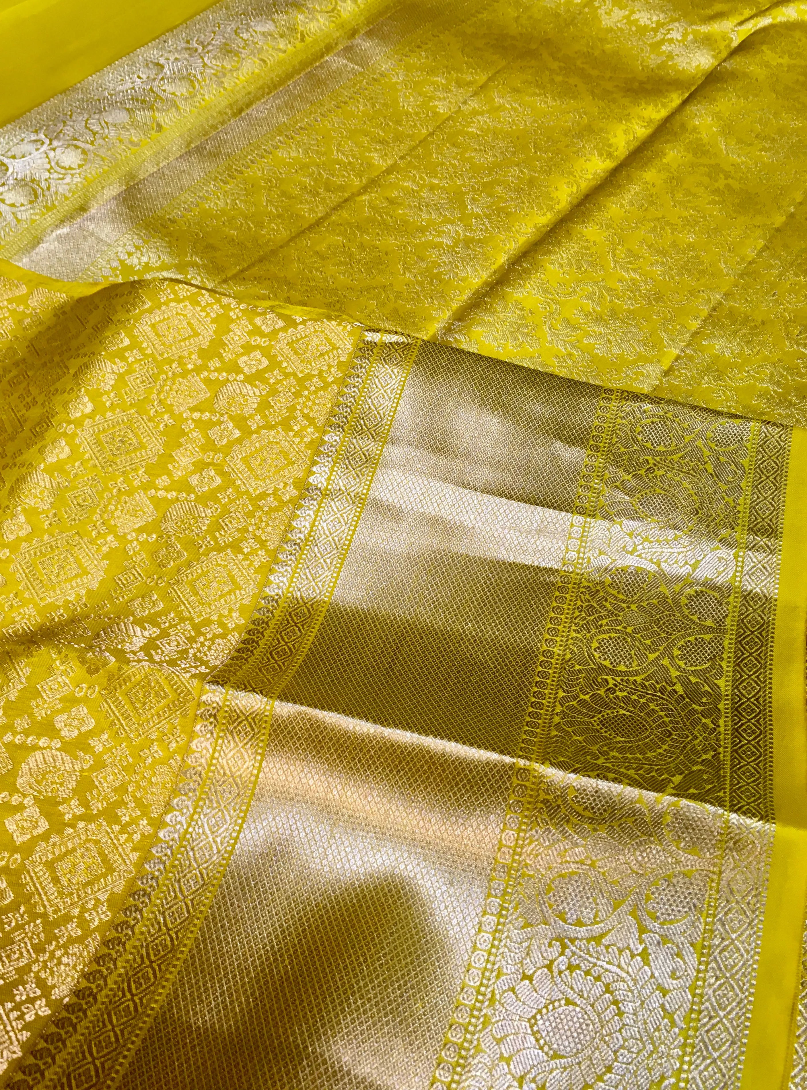 KSS307 Equisite Kanjivaram Pure Silk Brocade Saree In Yellow. Fall Peco done. Comes with stitched blouse size: 38 to 46. SILK MARK CERTIFIED