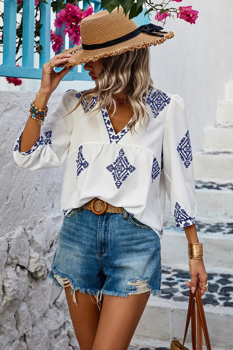 Moroccan Blue in White Blouse