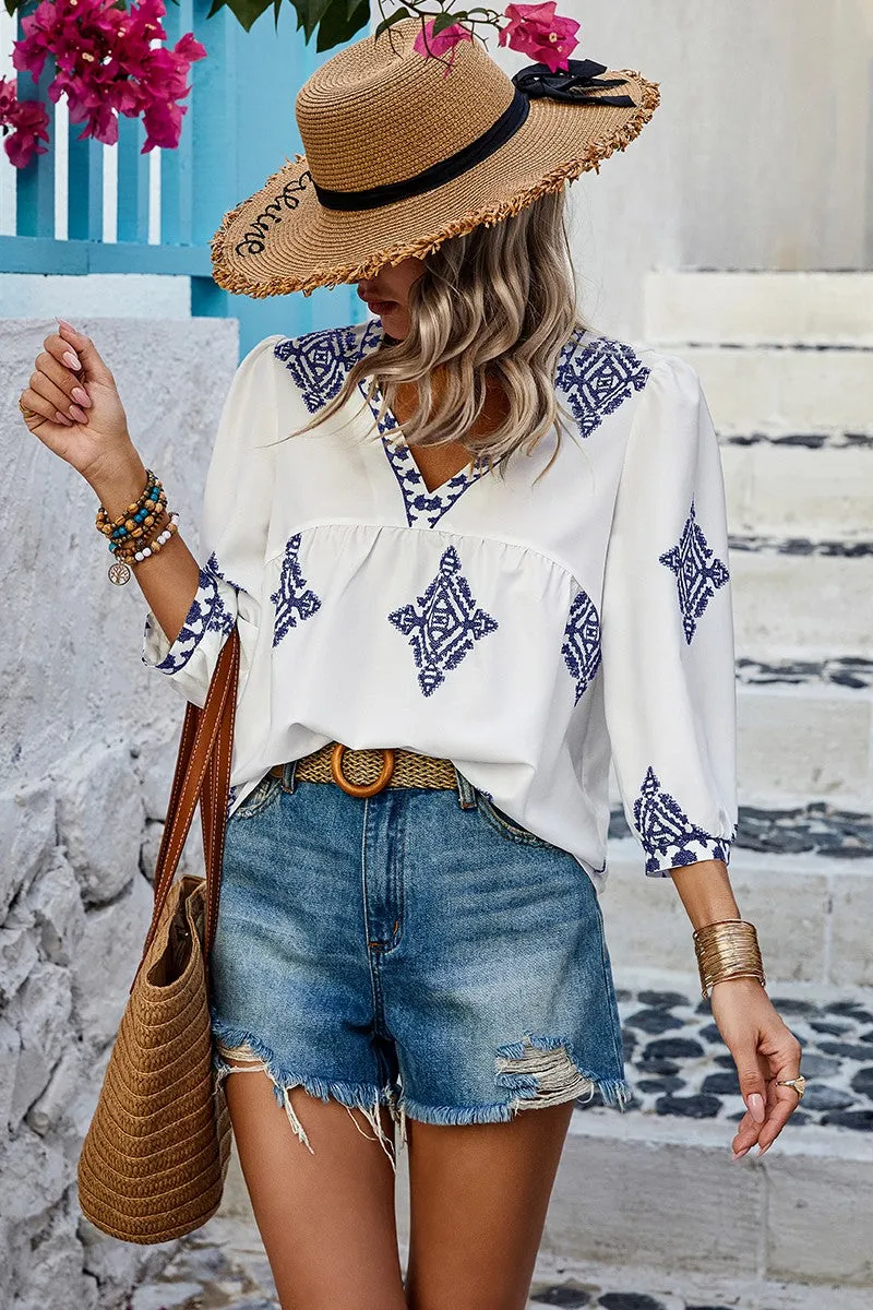 Moroccan Blue in White Blouse