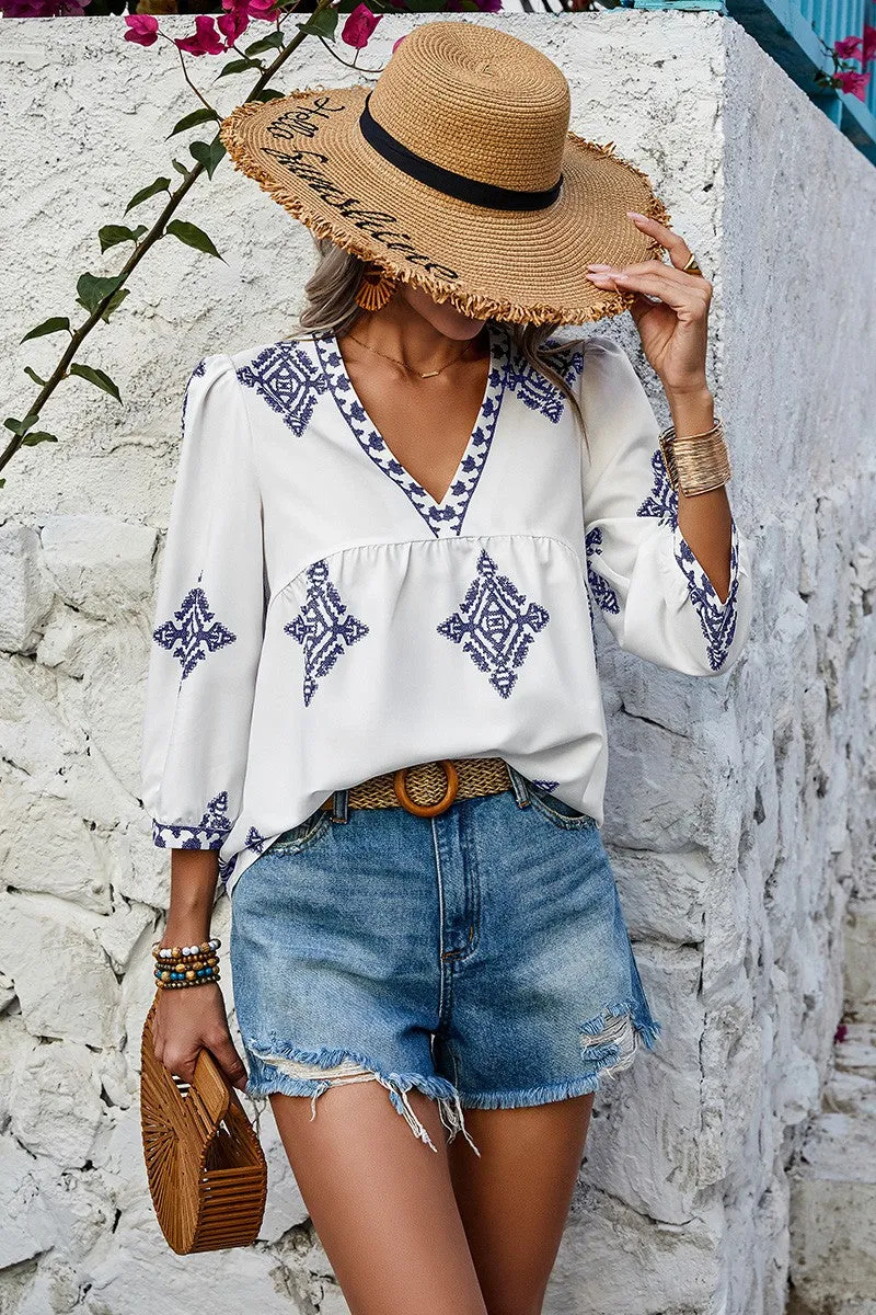 Moroccan Blue in White Blouse