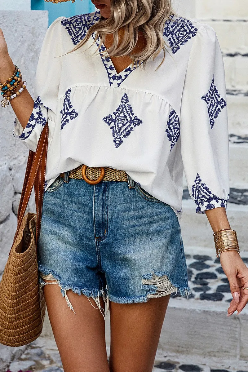 Moroccan Blue in White Blouse