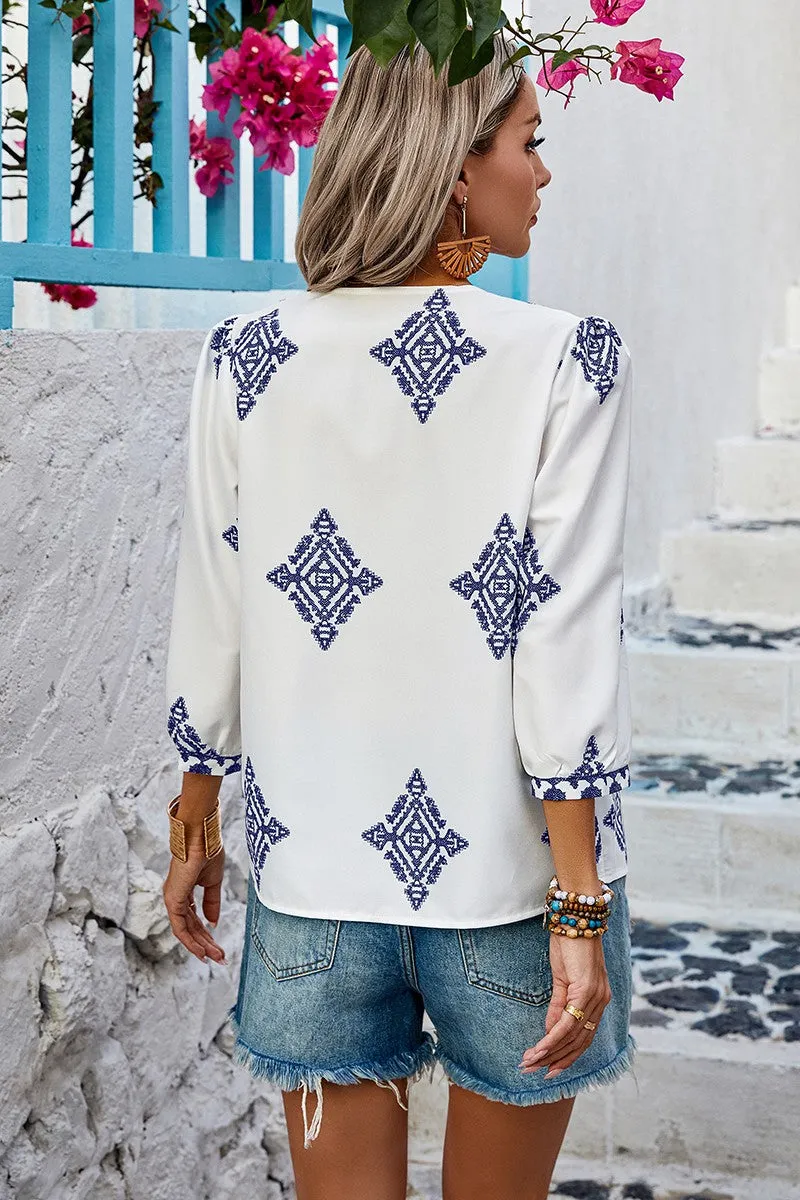 Moroccan Blue in White Blouse