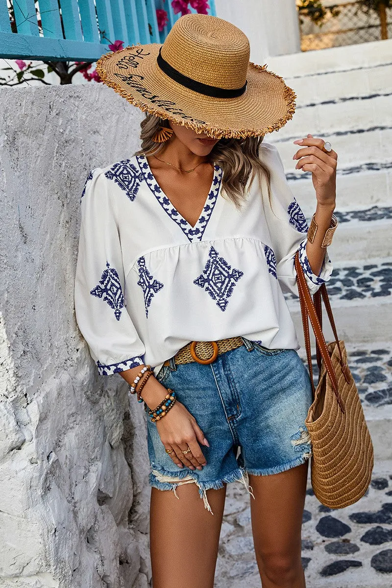 Moroccan Blue in White Blouse